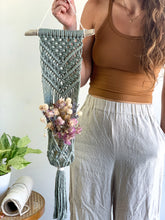 Load image into Gallery viewer, sage driftwood plant hanger holding a mason jar of dried flowers