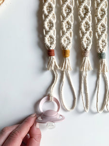 handmade macrame pacifier clip with pacifier as example
