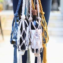 Load image into Gallery viewer, handmade macrame wine totes holding wine
