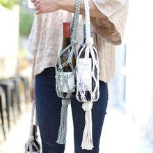 Load image into Gallery viewer, two macrame wine totes holding wine